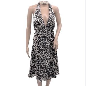 White House Black Market 100% Silk Halter Dress Floral Swirl
Cocktail Size 6